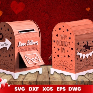 Puede incluir: Dos buzones de madera decorados con corazones y diseños con temática del Día de San Valentín. Un buzón dice "Love Box" y "XOXO" y el otro dice "Love Letters" y "Special Delivery".