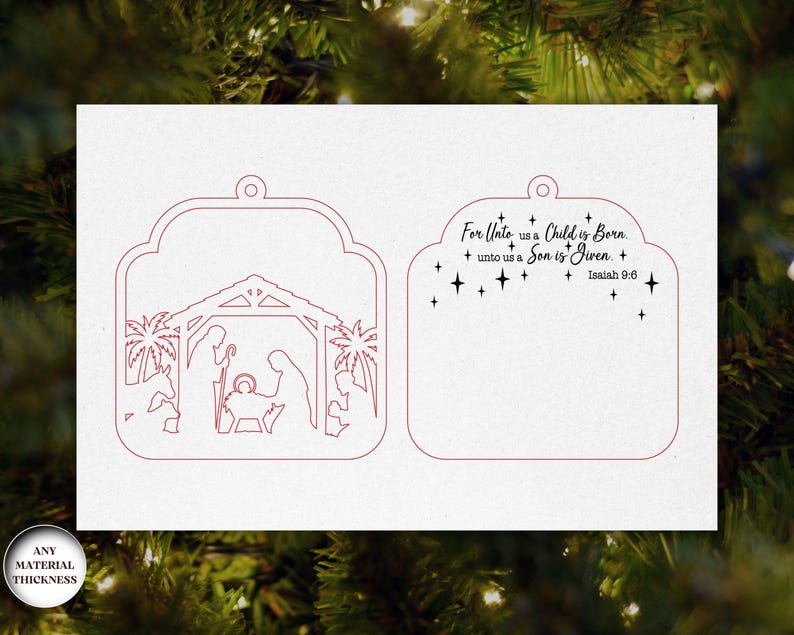 May include: A white Christmas ornament with a red outline of a nativity scene and the text "For Unto us a Child is Born, unto us a Son is Given, Isaiah 9:6". The ornament has a decorative shape with a hole for hanging.