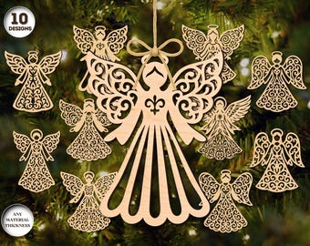 May include: A collection of ten wooden angel ornaments in various designs, hanging against a blurred green background. The angels feature intricate cut-out patterns and are made of light-colored wood. The image includes text that says "10 DESIGNS" and "ANY MATERIAL THICKNESS".