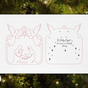 May include: Two-sided Christmas ornament with a nativity scene and the text "O Holy Night! The Stars are Brightly Shining." The ornament features a red outline design with angels, stars, and the holy family.
