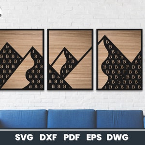 May include: Three wood wall art panels with a geometric design featuring black cutouts of the letter "B" in a repeating pattern. The panels are mounted on a white brick wall.