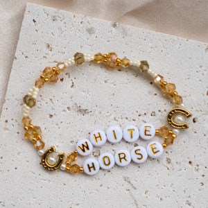 Friendship bracelets Eras Tour Fearless collection White Horse