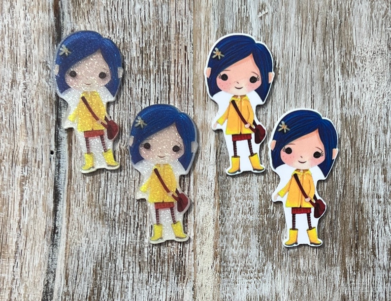 May include: Four colourful cartoon character stickers featuring a girl with blue hair wearing a yellow raincoat and holding a brown bag. The stickers are printed on a white background.