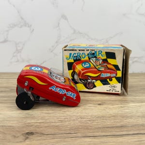 Vintage 1960&#39;s Yone Japanese Tin Acro Car Mechanical Wind Up Toy in Original Box, Wind-Up Novelty Toy, Yoneya, Japan, Tinplate Litho Car
