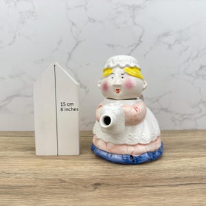 Novelty Woman Teapot Character | Vintage Ceramic Lady Holding Pot Kettle | Collectible Whimsical Home Decor Art Gift for Tea Lover