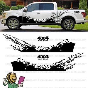 May include: Black and white decal set for a truck with a mud splatter design and the text "4x4 Off Road".