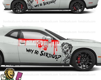 May include: A white car with a black and red graphic of the Joker from Batman. The graphic includes the Joker's face, dripping blood, and the words "Why So Serious?"