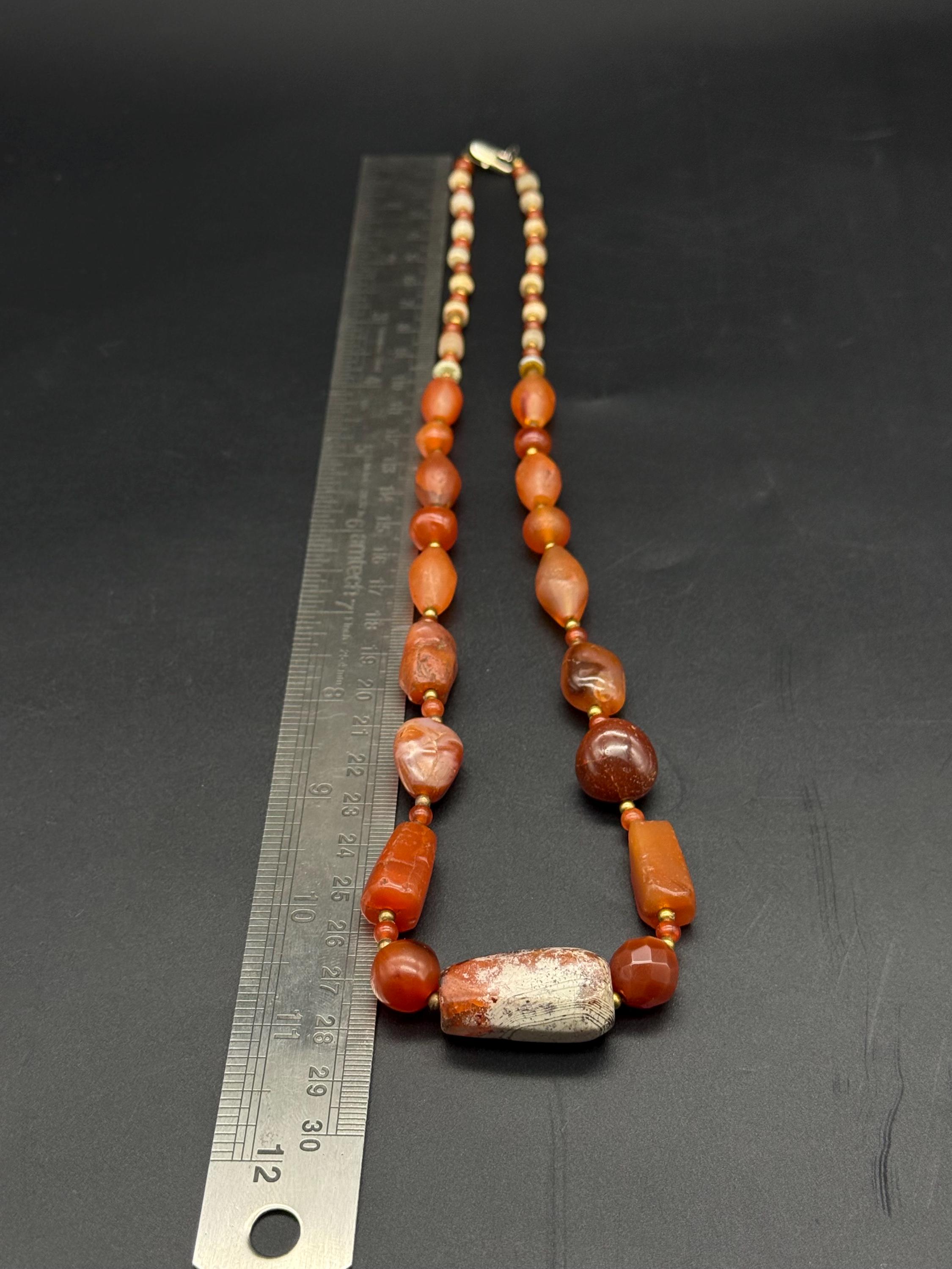 アンティークビーズ/カーネリアンネックレス カレン 族 シルバー アンティークビーズ カーネリアン 鹿革紐