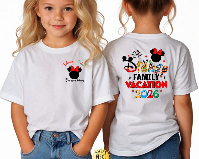 May include: White t-shirt featuring a Minnie Mouse design with a red bow and the text "Disney 2026". The back of the shirt displays "Disney Family Vacation 2026" with character graphics. The shirt is worn by a child.