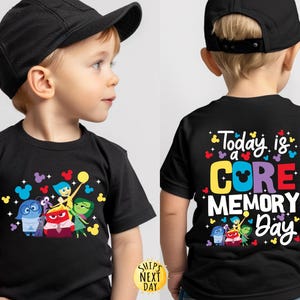 May include: Black t-shirt with a graphic of the characters from the movie Inside Out. The text on the back of the shirt says "Today is a CORE MEMORY Day".