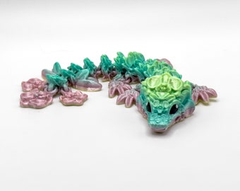 Bloom-tastic 3D Printed Baby Dragon Covered in Orchids
