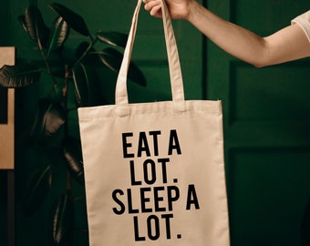 Eat a lot. Sleep a lot. Tote Bag