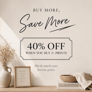 May include: A promotional graphic featuring the text BUY MORE, Save More, 40% OFF WHEN YOU BUY 3+ PRINTS, and Mix & match your favorite prints. The image includes a beige vase with dried flowers, a framed print, and a woven basket on books.