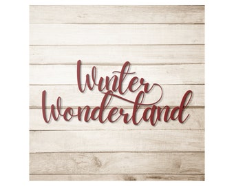 May include: Red cursive lettering on a white wood background reads "Winter Wonderland".