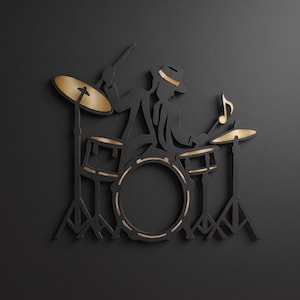 May include: A wall art piece depicting a drummer wearing a hat, crafted from matte black material with metallic gold accents on the drum kit, cymbals, and a musical note. The design features a silhouette of a musician playing a drum set.