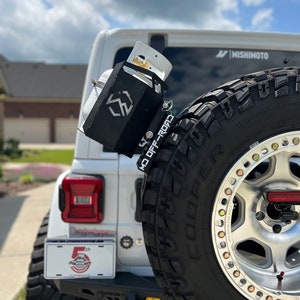 Propane tank mounting bracket and propane tank not included. Shown as an example of mounting options.