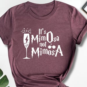 It’s MimOsa Not MimosA T-Shirt, Funny Wizard Brunch Tee, Magic Humor Shirt for Readers, Cocktail Party Graphic Tee, Sassy Bookish Gift