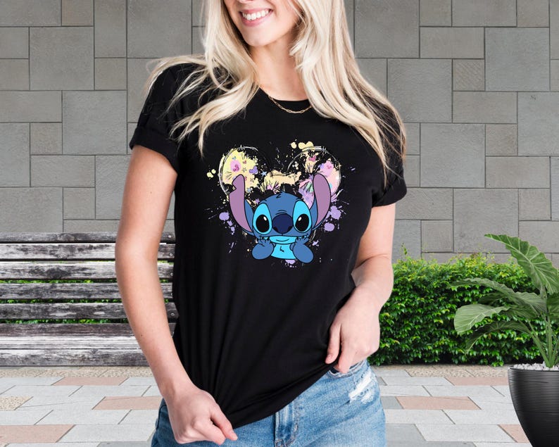 a woman wearing a t - shirt with a stitching stitch stitch stitch stitch stitch