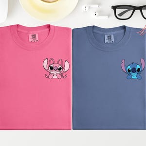 a pair of t - shirts with stitching on them