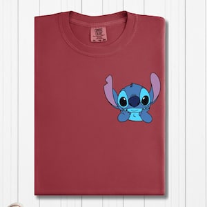 a red shirt with a stitch stitch stitch stitch stitch stitch stitch stitch stitch stitch stitch