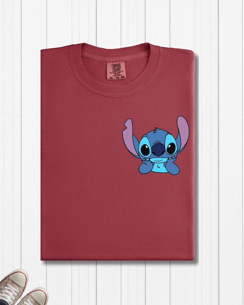 a red shirt with a stitch stitch stitch stitch stitch stitch stitch stitch stitch stitch stitch