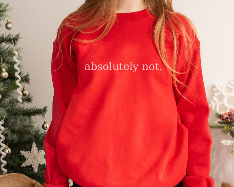 May include: Red sweatshirt with the text "absolutely not." printed in white.