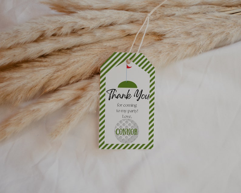 May include: Green and white striped thank you tag with a golf ball design and the text "Thank You for coming to my party! Love, Connor".