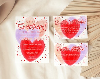 May include: Baby shower invitations and inserts with a watercolor heart design. The invitation reads "A Little Sweetheart is on the Way" with event details. Inserts include "Books for Baby" and "Diaper Raffle" cards.
