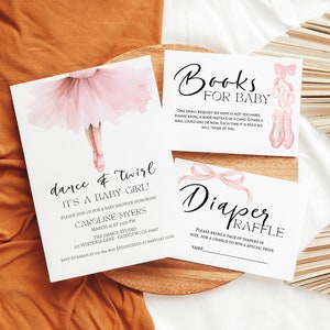 May include: Two printable cards for a baby shower. The first card is pink and white with a ballerina illustration and the text "dance & twirl it's a baby girl!" The second card is white with pink ribbon accents and the text "Books for Baby" and "Diaper Raffle".