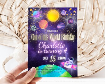May include: Purple and blue space-themed birthday invitation with gold glitter stars. The invitation says "Out of this World Birthday" and "Charlotte is turning 4". It also includes the date and time of the party, "July 15, 2:00PM".