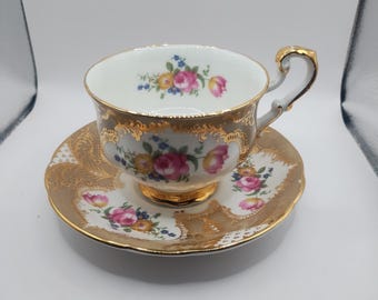 Taza y platillo de té vintage de porcelana fina Paragon.