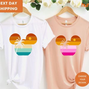 a couple of t - shirts that are next to each other