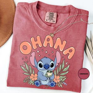 a red shirt with a stitch stitch stitch stitch stitch stitch stitch stitch stitch stitch stitch