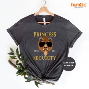 a t - shirt with a picture of a bear wearing sunglasses