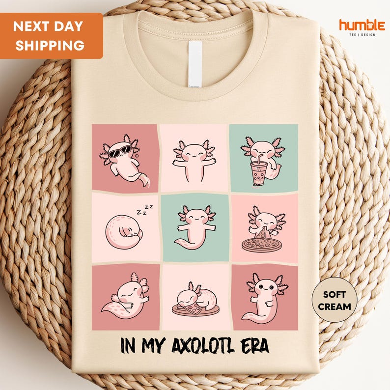 a t - shirt with a picture of cats on it