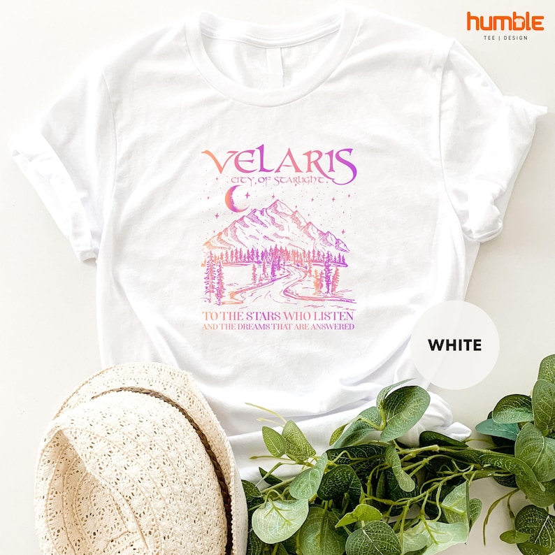 a white t - shirt with the words velaris on it