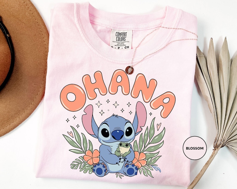 a pink shirt with an image of stitch stitch stitch stitch stitch stitch stitch stitch stitch