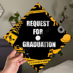 May include: Black and yellow graduation cap with the text "Request for Graduation" and construction imagery, including a worker, a bulldozer, a crane, and a dump truck.