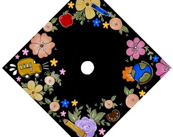 May include: A black diamond-shaped chalkboard with a white circle in the center. The chalkboard is decorated with a colorful border of flowers, a school bus, a pencil, a paint palette, and a globe.