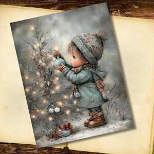 May include: A digital art print depicts a child decorating a Christmas tree in a snowy scene. The child wears a blue coat, hat, and scarf. The tree is adorned with lights and ornaments. The print is set against a backdrop of a vintage book.