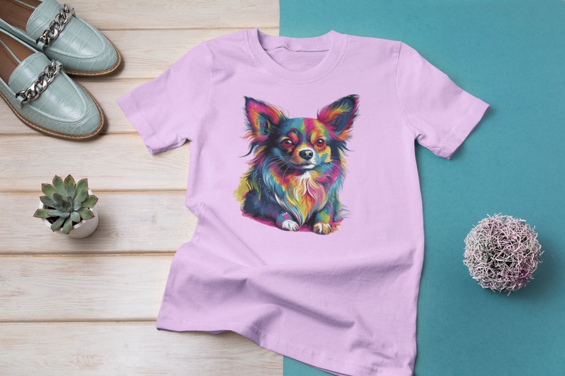 Vibrant Pop Art Long-Hair Chihuahua graphic of a fun and colorful design for any dog lover printed on a pink short sleeve shirt.