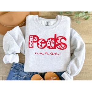 Kinder Krankenschwester Sweatshirt, Kinder Krankenschwester Shirt, Pädiatrie Crewneck, Kinder Krankenschwester Geschenk, Krankenschwester Wertschätzung Geschenk, Pädiatrie Krankenschwester Sweatshirt