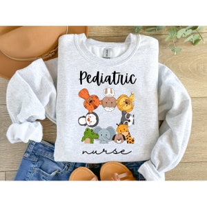 Kinder Krankenschwester Sweatshirt, Kinder Krankenschwester Shirt, Pädiatrie Crewneck, Kinder Krankenschwester Geschenk, Krankenschwester Wertschätzung Geschenk, Pädiatrie Krankenschwester Sweatshirt