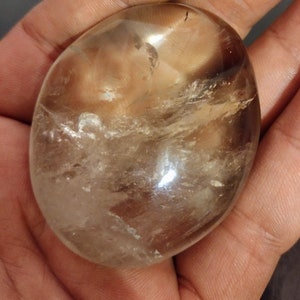 Clear quartz palm stone