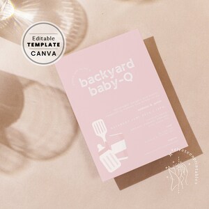 May include: Pink baby shower invitation with white text that reads "backyard baby-Q" and includes a spatula and a jar with a lid. The invitation also includes the date, time, and address for the event.