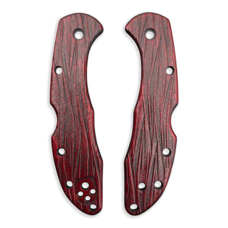 Puede incluir: Dos cachas de mango de cuchillo de madera te&ntilde;ida de rojo con textura de vetas de madera. Cada cacha tiene una forma curva con m&uacute;ltiples agujeros para la fijaci&oacute;n. Las cachas est&aacute;n dise&ntilde;adas para un mango de cuchillo.