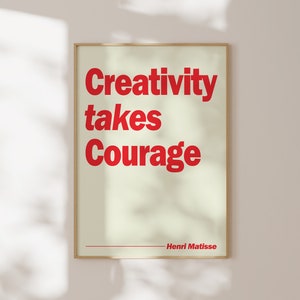 May include: A beige poster with a red quote that reads "Creativity takes Courage" by Henri Matisse.