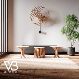 May include: Three wooden side tables with a white fluffy rug in front of them. A wooden wall sculpture hangs on a white wall behind the tables. A potted plant is on the right side of the image. The text "V3 VECTOR BEAM" is on the rug.