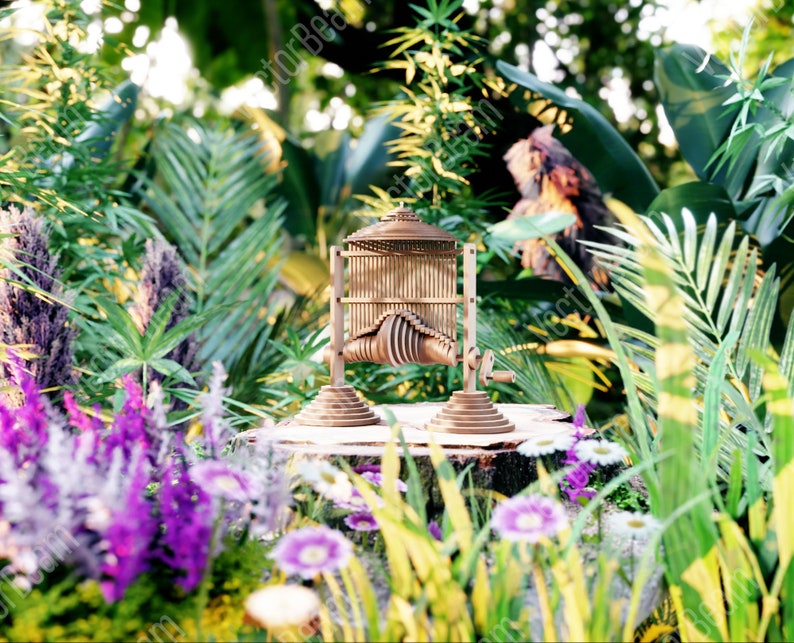 May include: A wooden kinetic sculpture with a complex design, featuring a series of interlocking pieces that move in a rhythmic pattern. The sculpture is placed on a tree stump in a lush green garden setting.