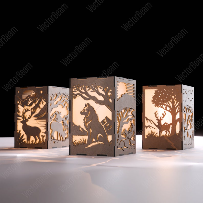 May include: Three wooden candle holders featuring intricate cut-outs of woodland animals and scenes. The holders are lit from within, casting a warm glow. The designs include a deer, a wolf, and a tree.
